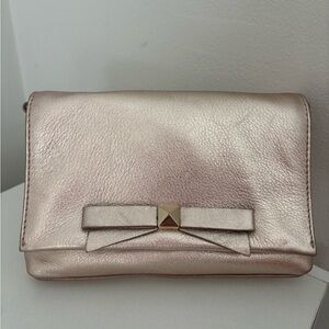 Kate Spade Metallic rose gold Clutch with Bow Accent